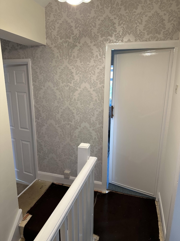 Why Choose Our Wallpapering Service?