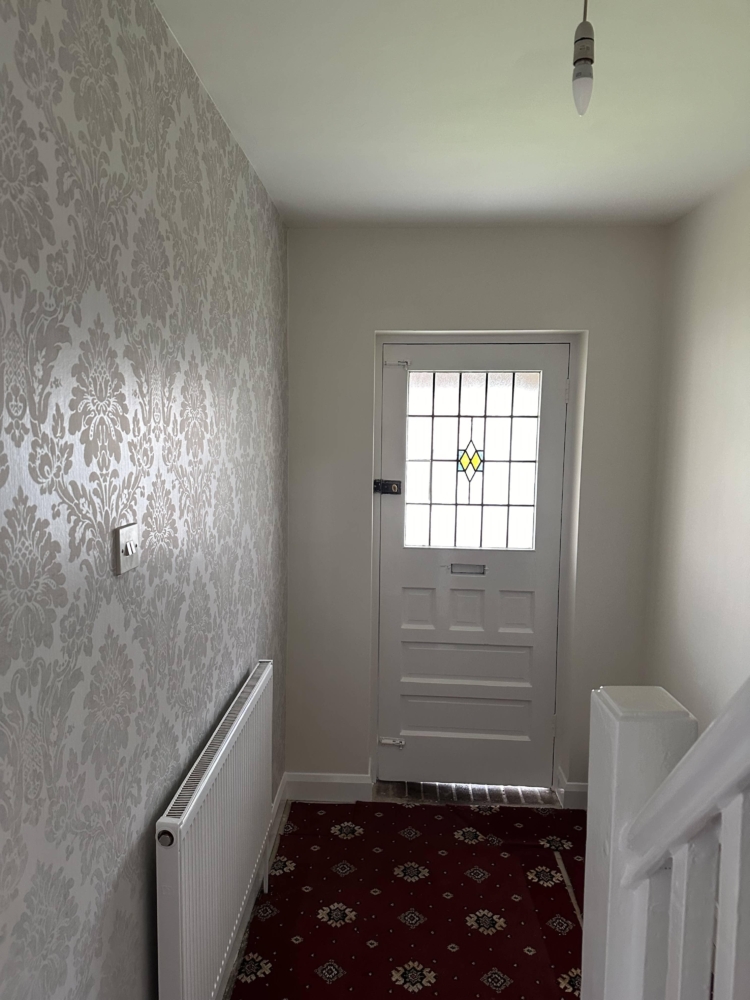Why Choose Our Wallpapering Service?